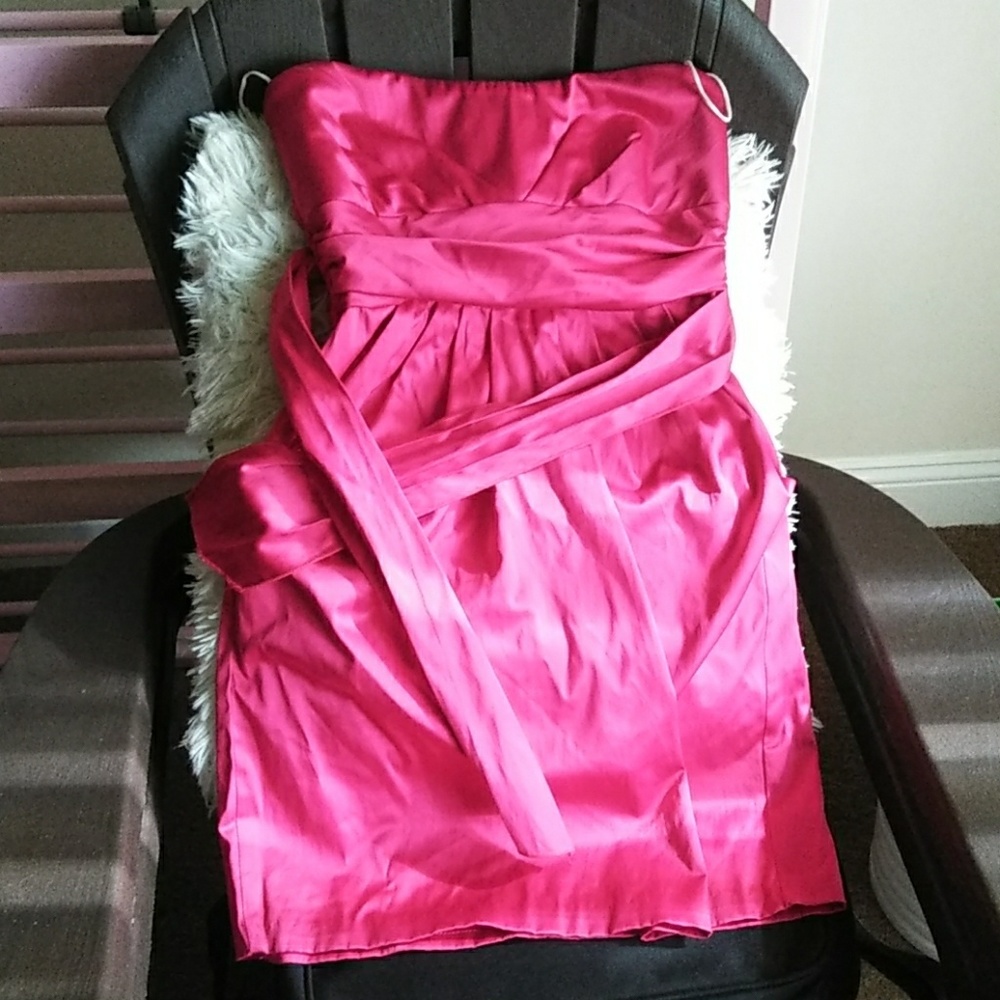 Pink body fitting dress with belt